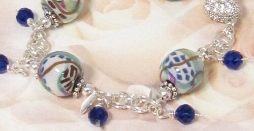 Chain mail bracelet with polymer clay and crystal beads Chain mail bracelet with polymer clay and crystal beads