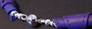Detail photo of the purple necklaces clasp