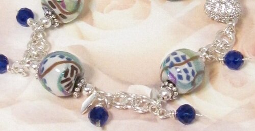 Chain mail bracelet with polymer clay and crystal beads